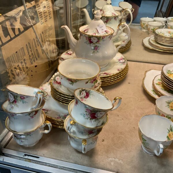 Vintage Royal Albert bone china tea set with floral design.
