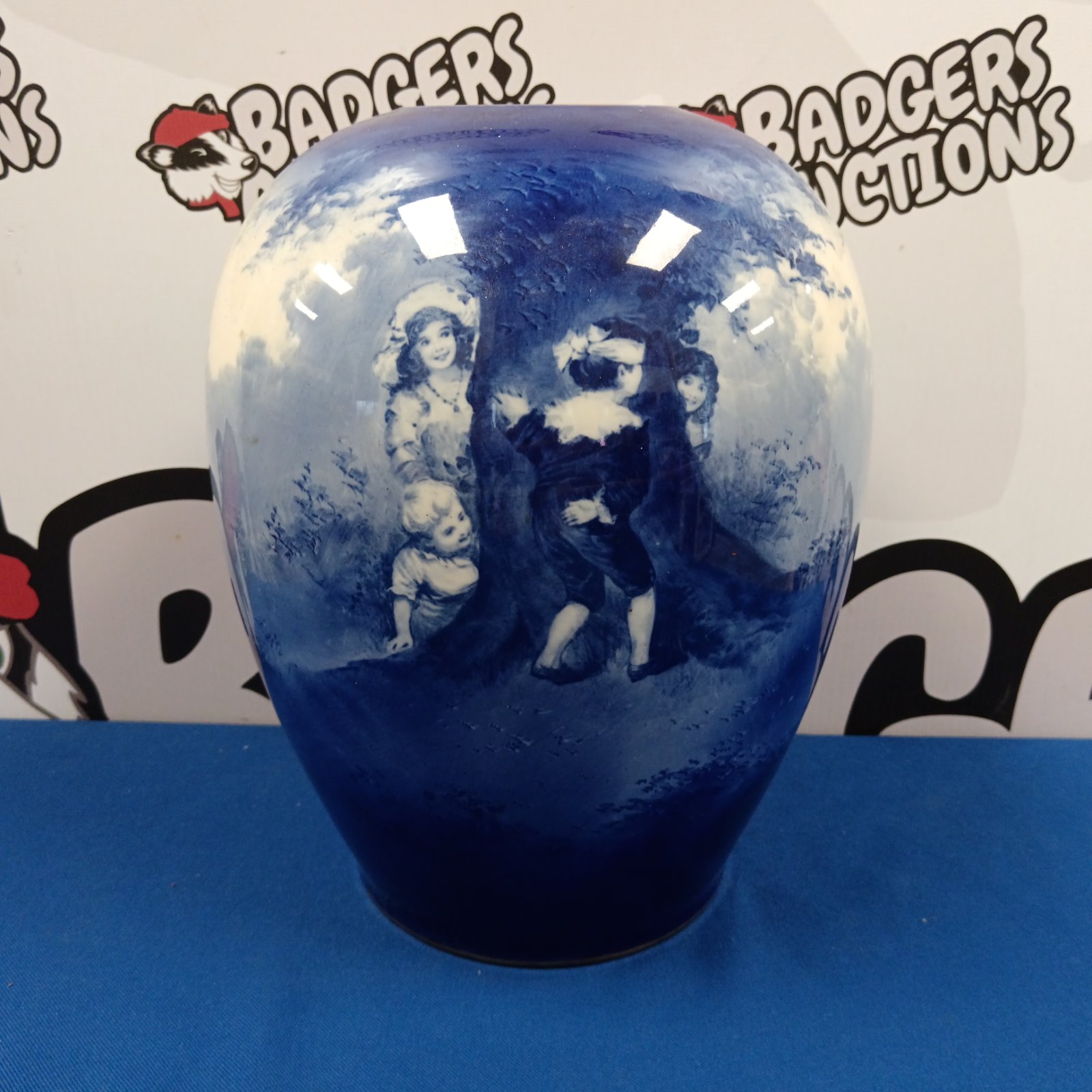 Royal Doulton Blue Children vase with transferware design.