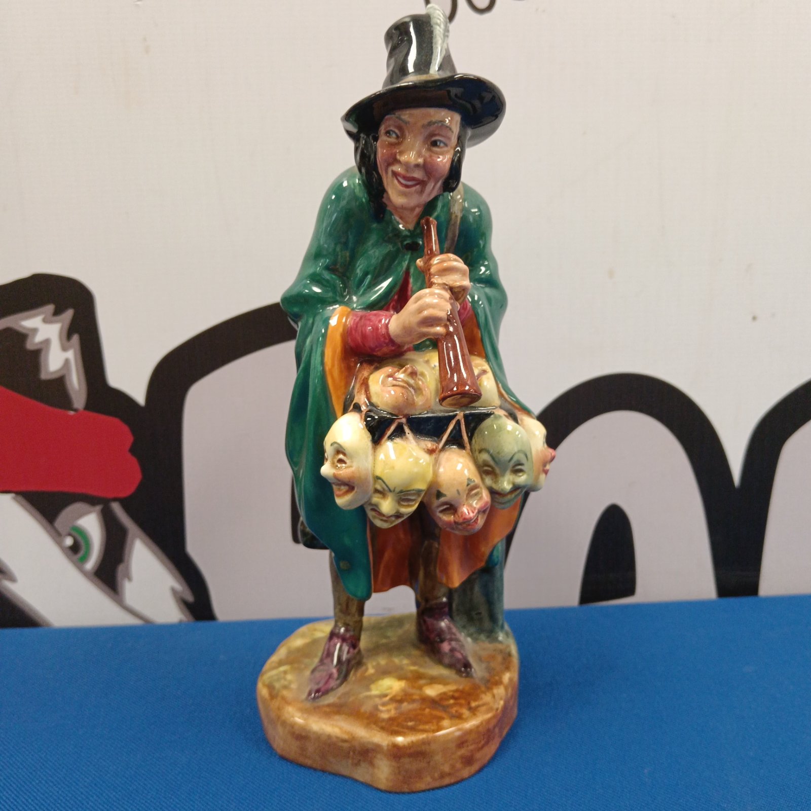 Royal Doulton Mask Seller figurine, vintage porcelain collectible.