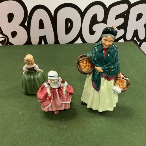Royal Doulton figurine of a lady carrying oranges.