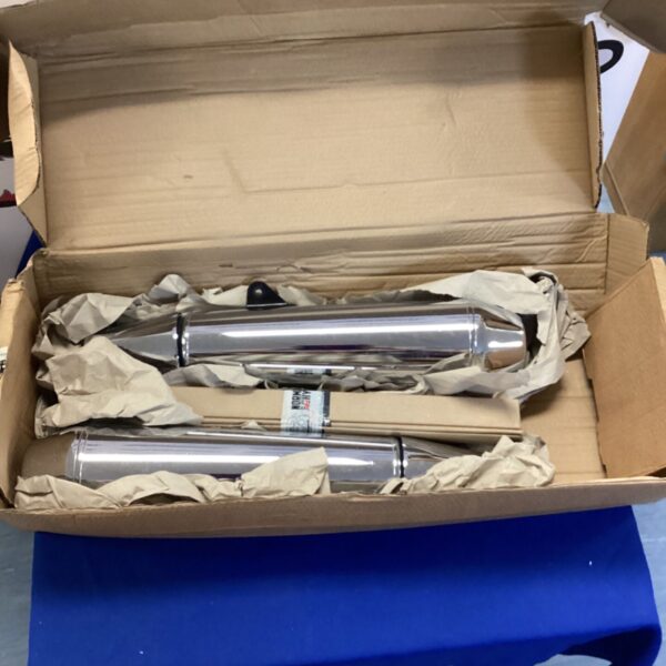 Unused chrome Royal Enfield exhausts in original packaging.