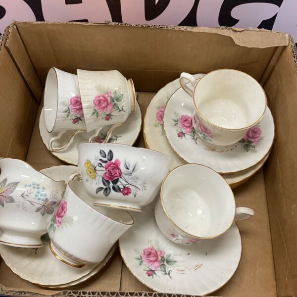 Vintage Royal Stafford tea set with rose pattern and gilded edges.
