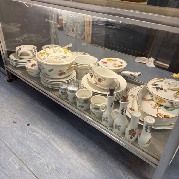 Large quantity of Royal Worcester Evesham dinner service china on display.