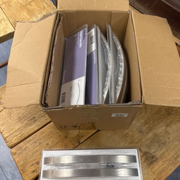 Box of new Sabaku bow handles for archery equipment.
