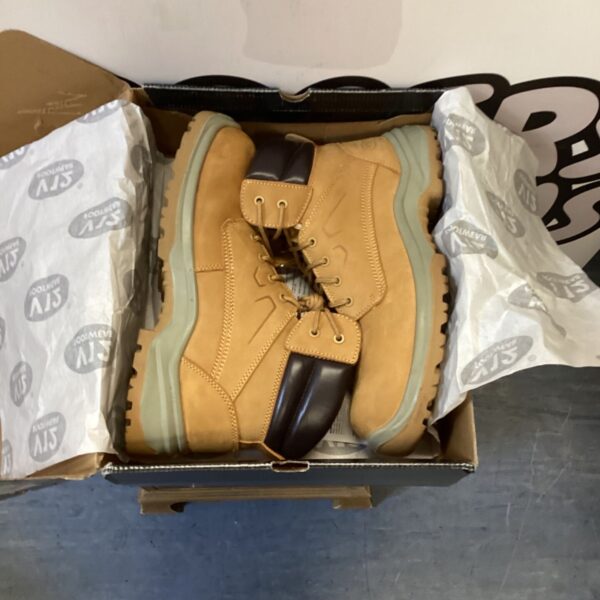 Size 13 safety boots showing wear and tear.