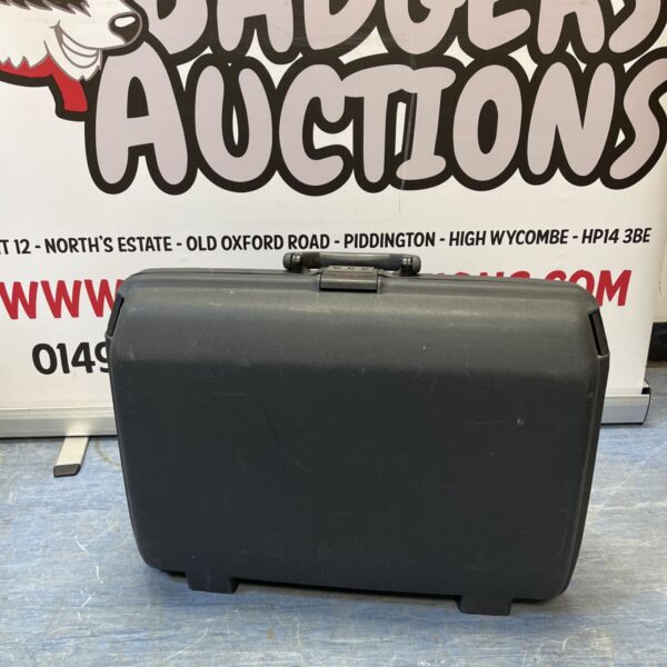 Vintage Samsonite suitcase with a hard shell exterior.