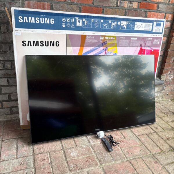 Boxed Samsung QLED 4K TV, model Q60T, with remote and cables.