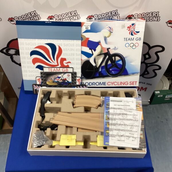 Vintage Scalextric velodrome cycling set in original packaging.