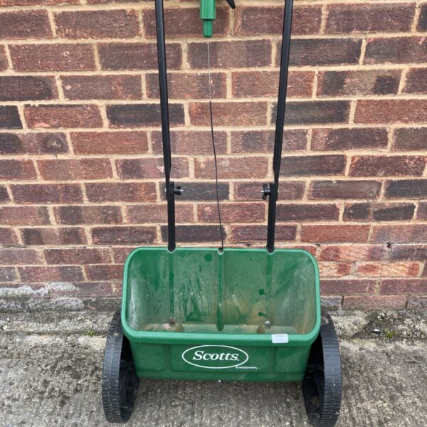 Vintage Scotts EvenGreen drop spreader for lawn care.