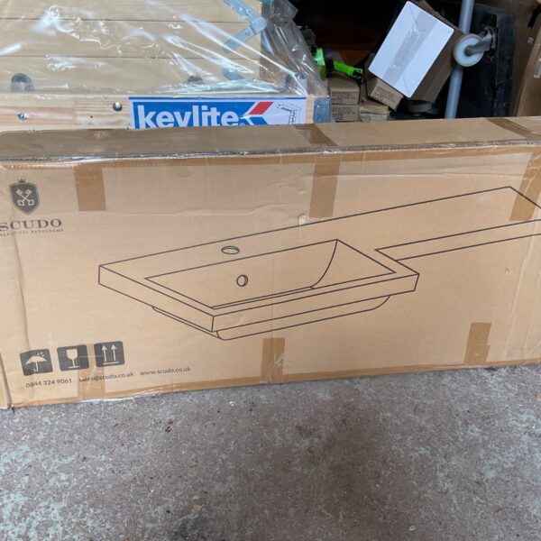 Scudo bathroom sink in original cardboard packaging.