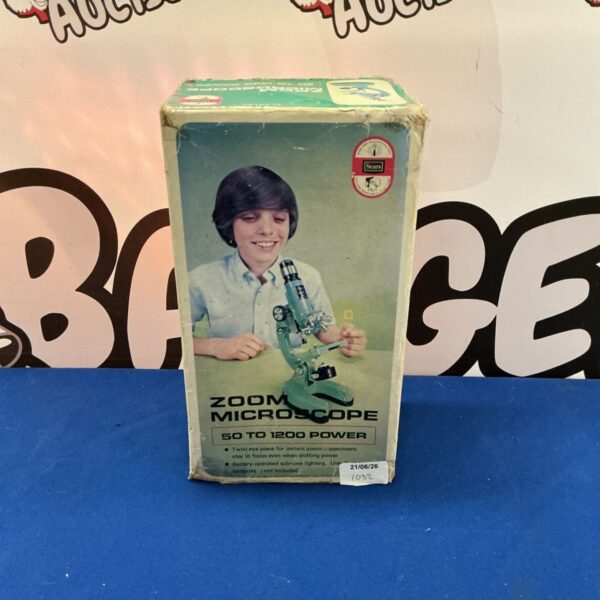 Vintage Sears Zoom Microscope in original box, collectible science toy.