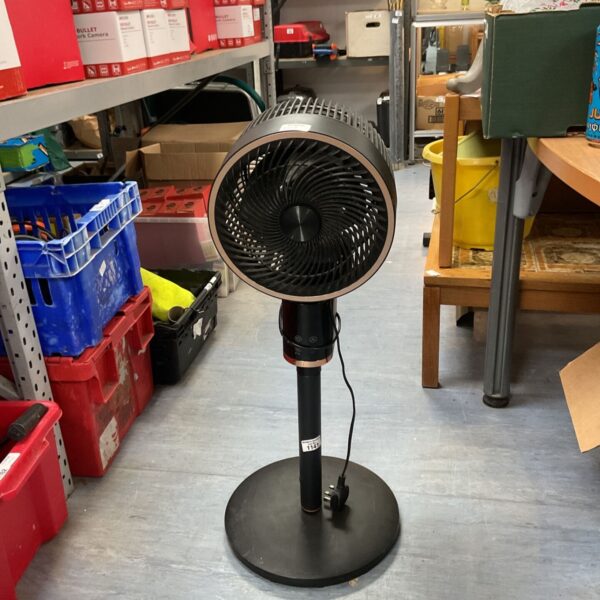 Black Shark Flexbreeze pedestal fan for cooling a room.