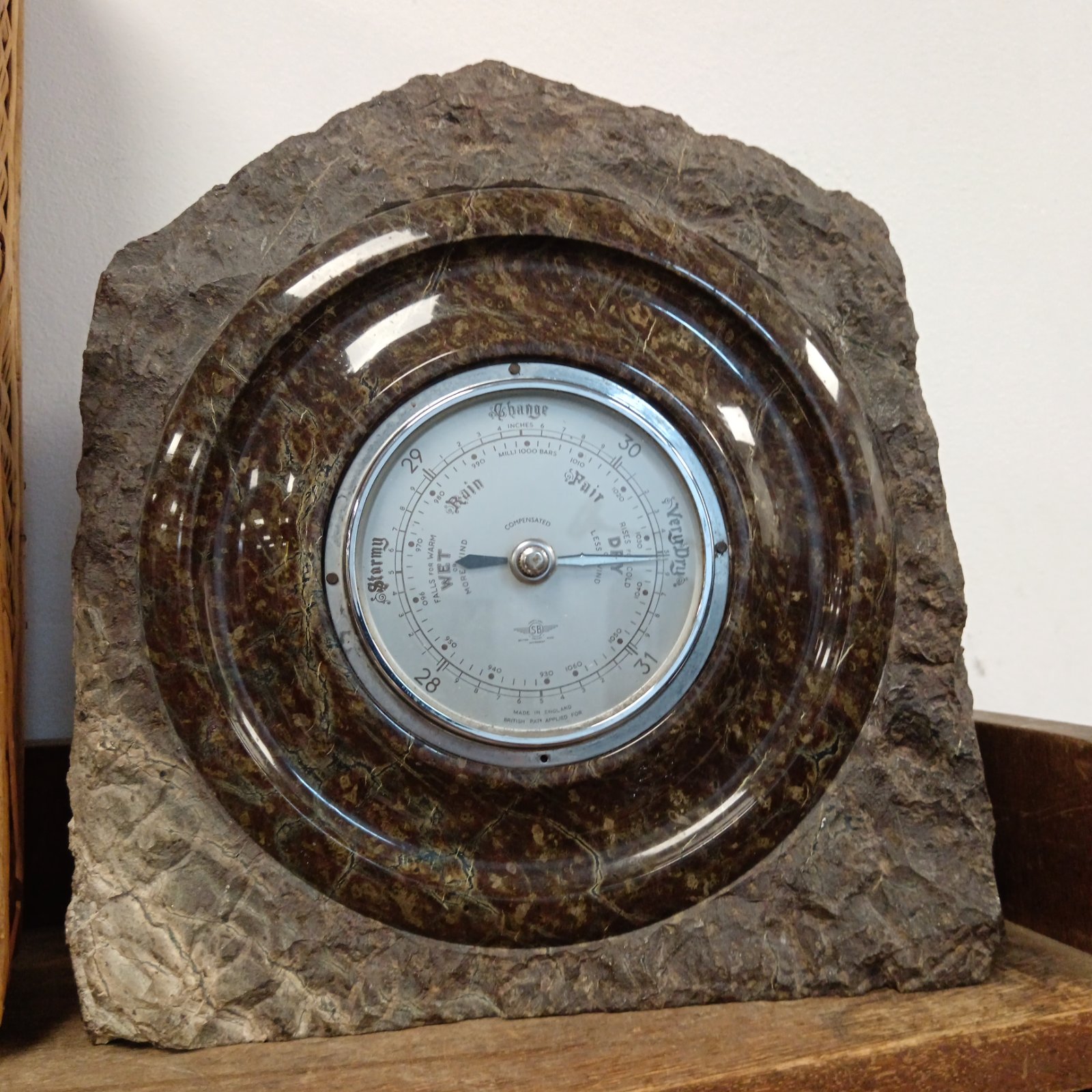 Antique Shortland marble barometer with brass dial and casing.