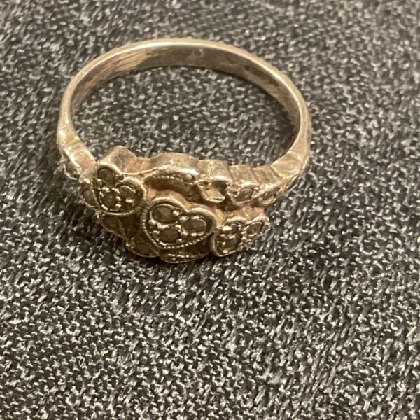 Vintage silver ring with marcasite floral design.