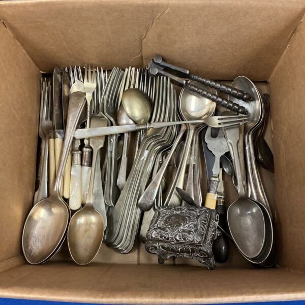 Vintage silver plate cutlery set with a small trinket pot.