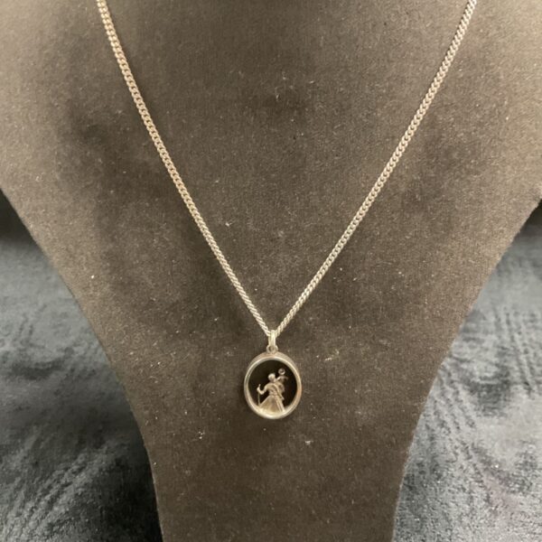 Vintage silver St Christopher medallion necklace with openwork detail.