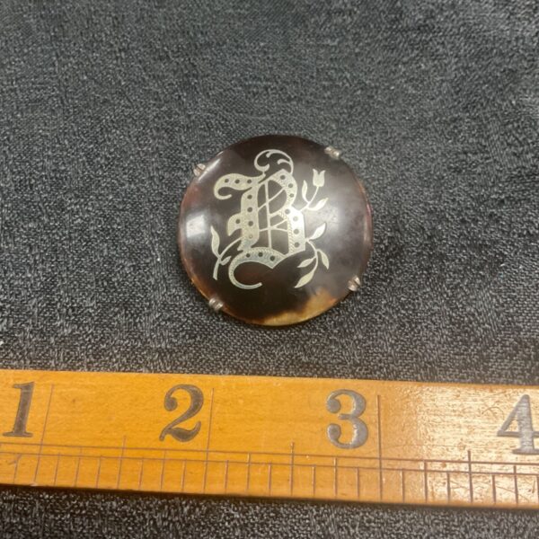 Vintage silver tortoise shell brooch with letter B inlay.