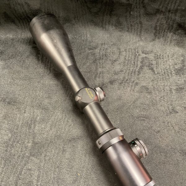 Vintage Simalux rifle scope with waterproof marking.