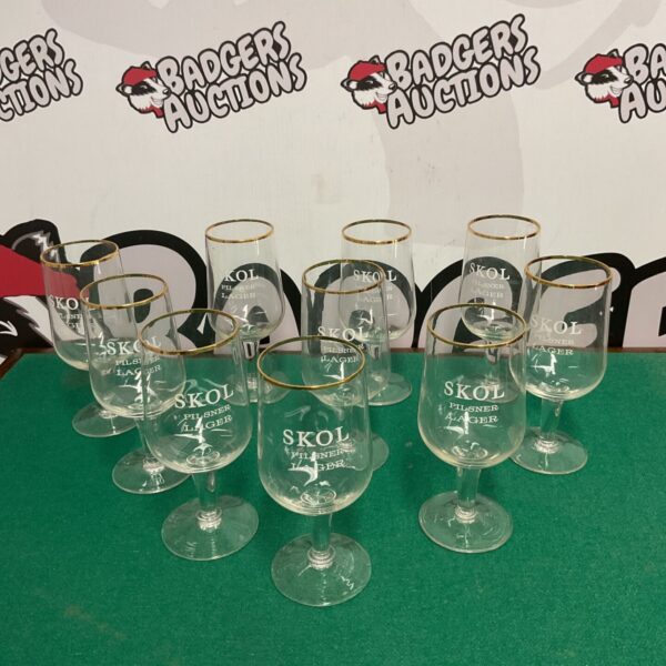 Lot of ten vintage Skol pilsner glasses for beer collectors.