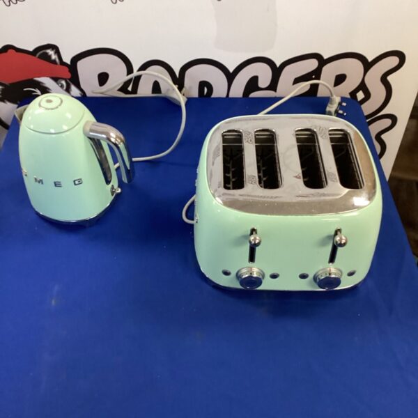 Pastel Smeg kettle and toaster set, retro kitchen appliance.