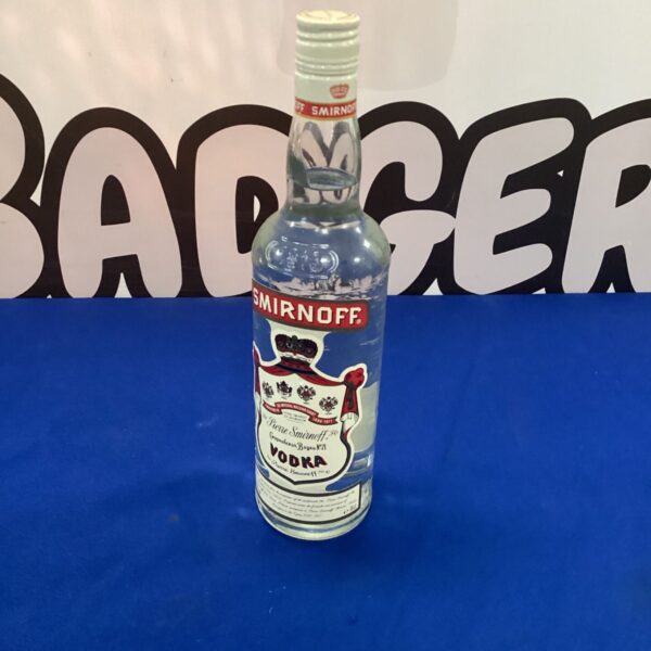 Unopened Smirnoff vodka bottle with classic label.