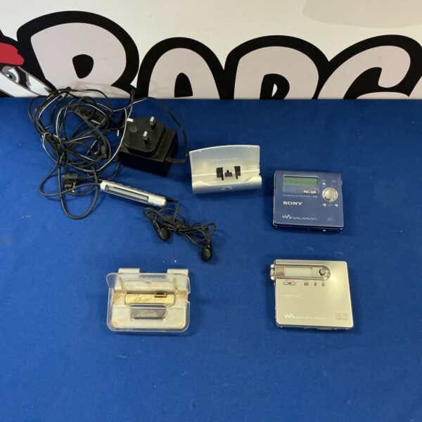 Sony MZ-R30 Mini Disc recorder with charging station and accessories.