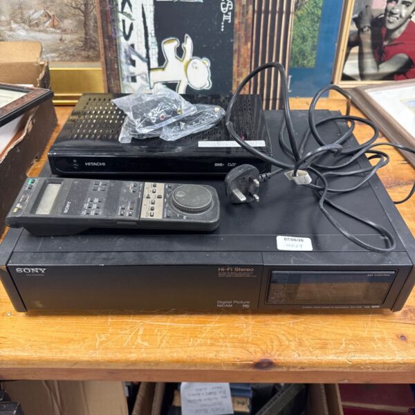 Vintage Sony SLV-815 VCR with Hitachi Freeview box, retro video player.