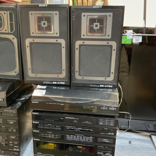 Vintage Sony stereo system with turntable and speakers.