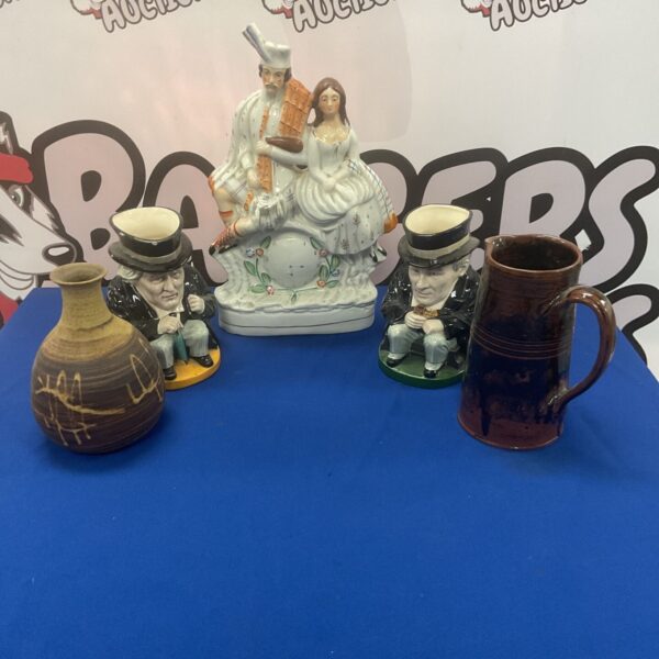 Vintage Staffordshire character jugs and pottery collection.