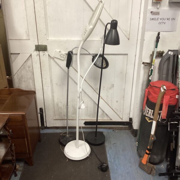 Three standard lamps including a flexible LED reading lamp.