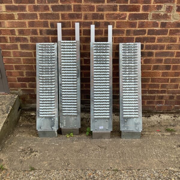 Set of steel access ramps for portable accessibility solutions.