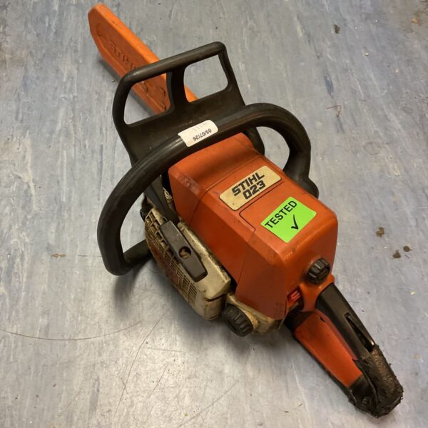 Used Stihl 23 chainsaw for sale, showing wear and tear.