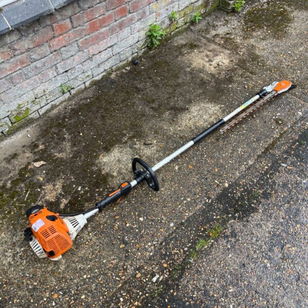 Stihl HL94 long reach hedge trimmer for garden maintenance.