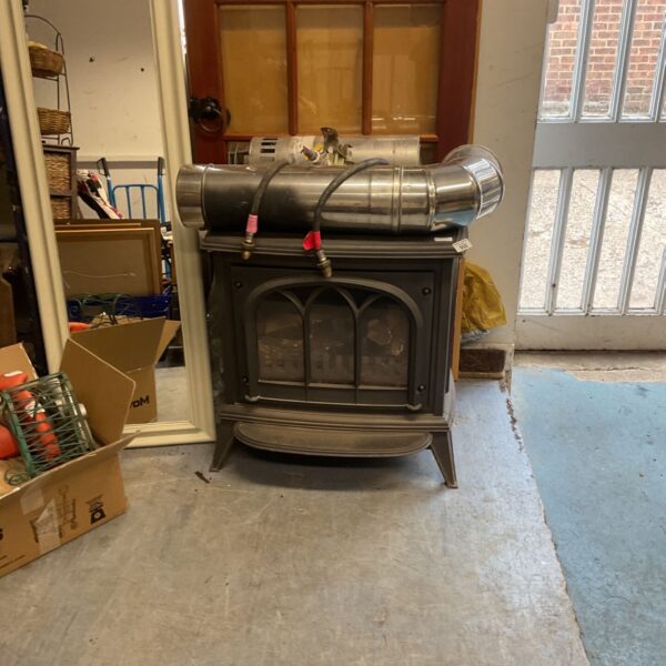 Vintage Stovax Huntingdon 40 gas cast iron stove with flue.