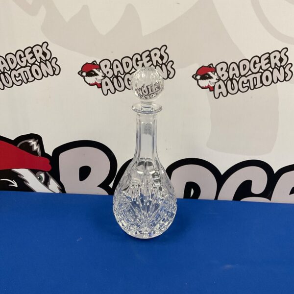 Elegant Stuart Crystal decanter with detailed cut glass.