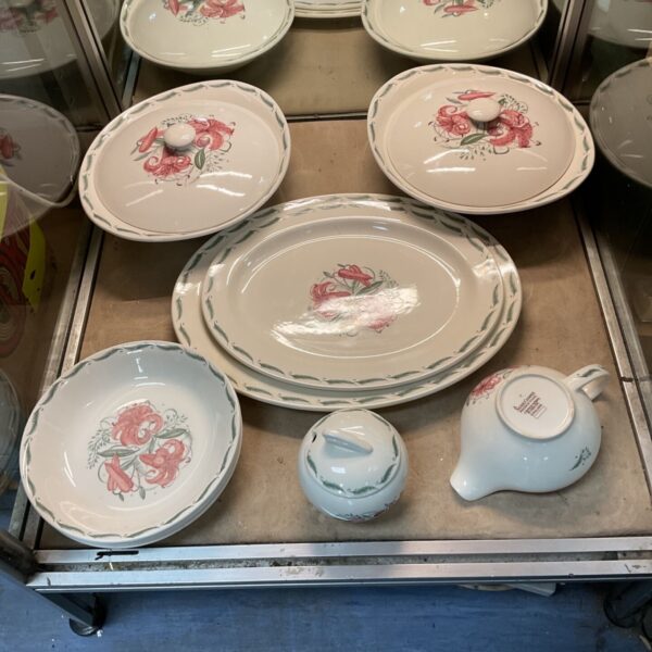 Susie Cooper Tiger Lily dinner service set on a metal trolley.
