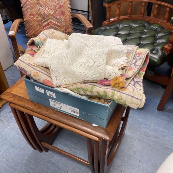 Job lot of vintage tablecloths with lace and embroidered details.