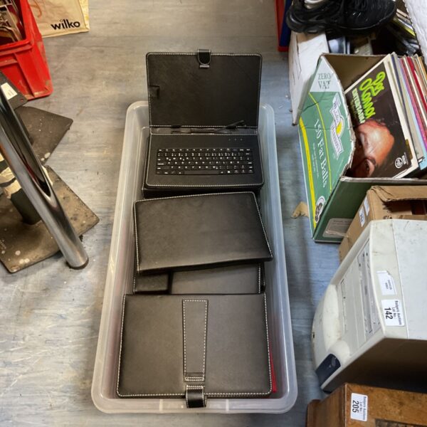 Black tablet case with integrated keyboard for portable typing.