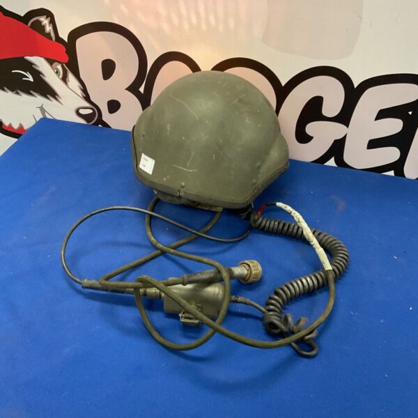 Olive drab tank crew helmet with headset attached.
