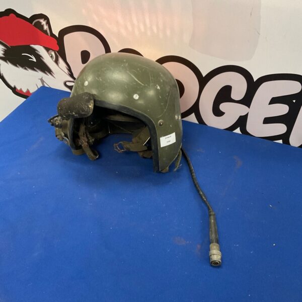 Vintage tank crew helmet with headset for military communication.