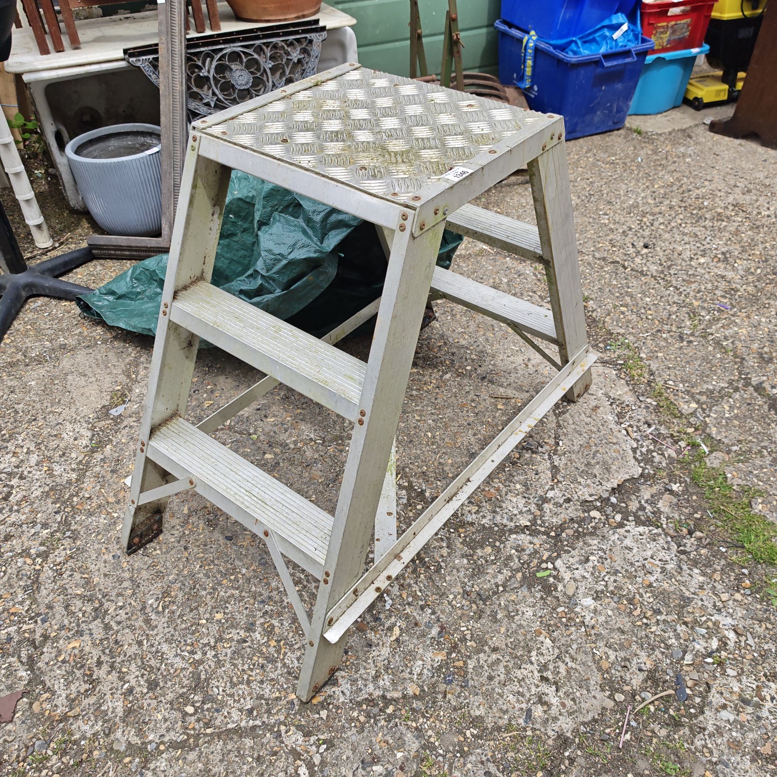 Vintage wooden Taskmaster step ladder, ideal for garden use.