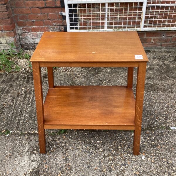 Vintage teak side table with two tiers, mid-century modern style.