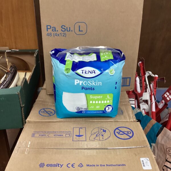 Four boxes of Tena Pro Skin Pants, size Large, in original packaging.