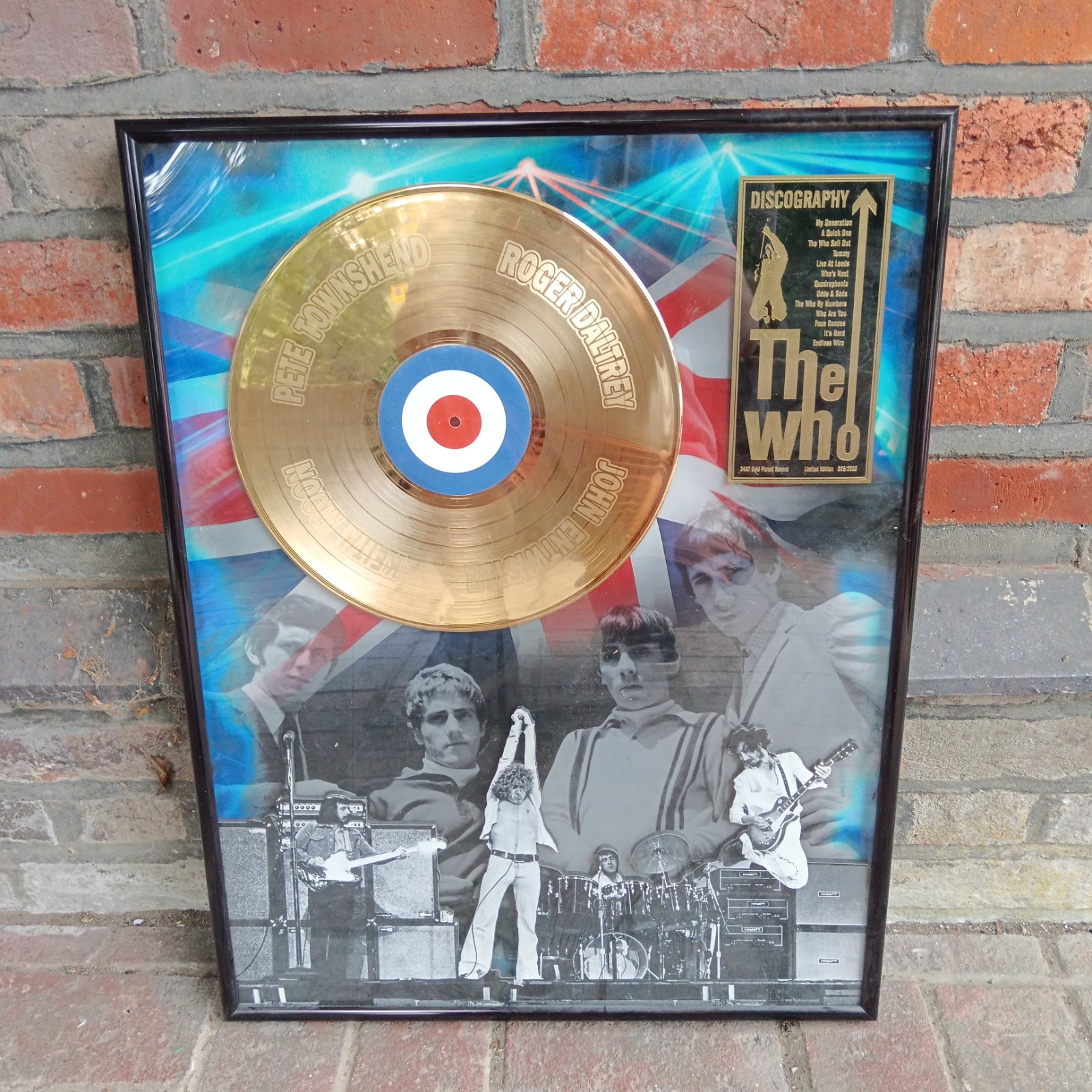 Framed The Who discography with 24kt gold plated disc.