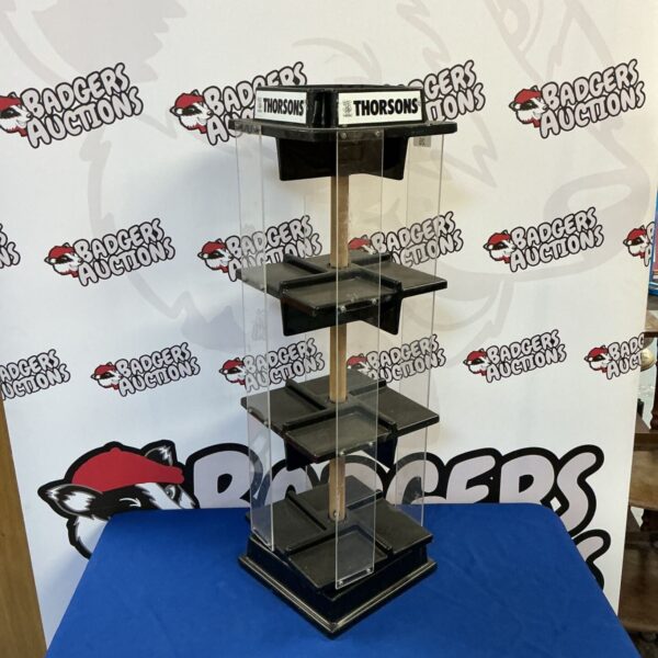 Thorsons tabletop revolving display unit in clear acrylic.