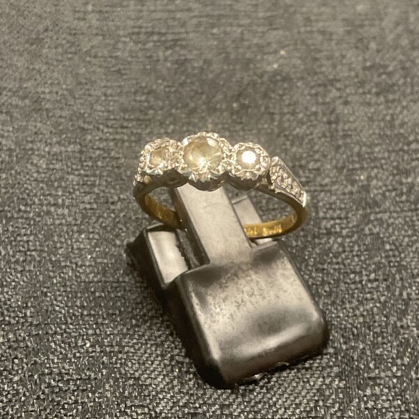 Vintage three stone ring in yellow and white metal, size M.