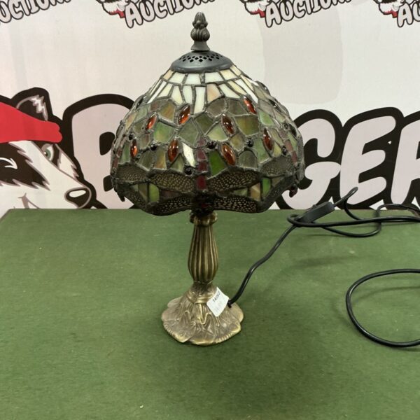 Vintage Tiffany-style desk lamp with stained glass floral shade.