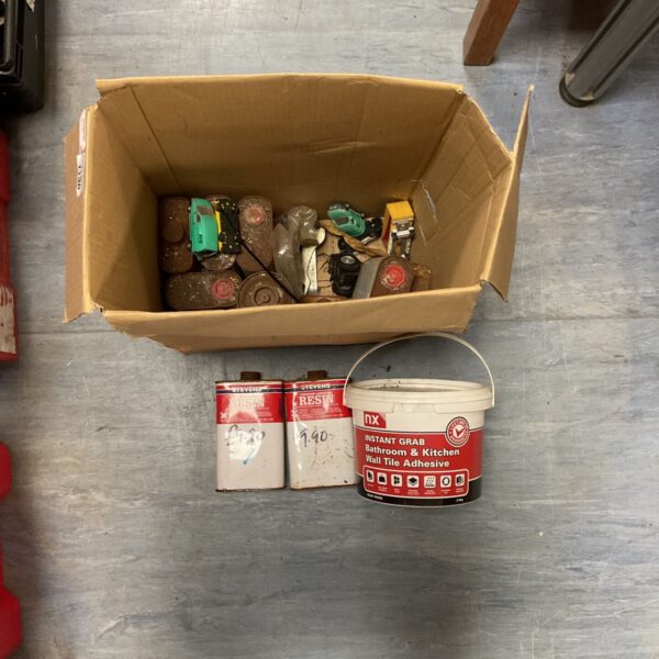 Mixed lot of tile adhesive and polyester laminating resin for DIY projects.