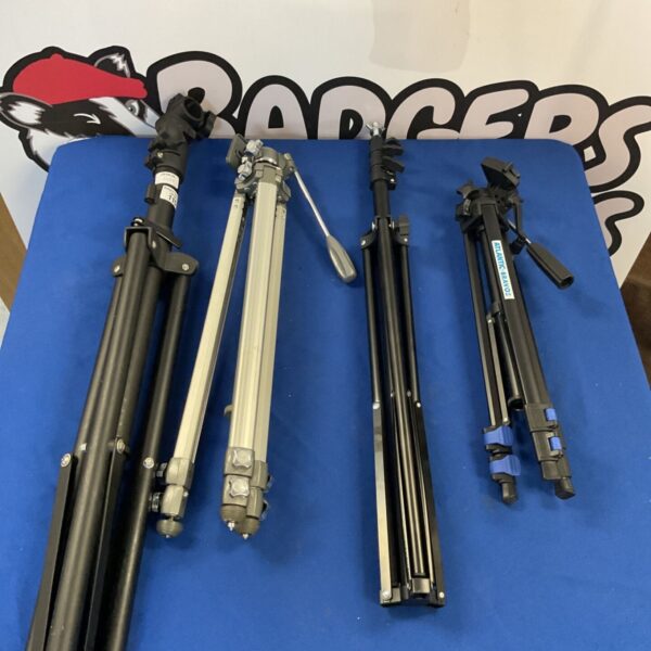 Four tripods including Atlantic bravo2 model for camera or lighting.
