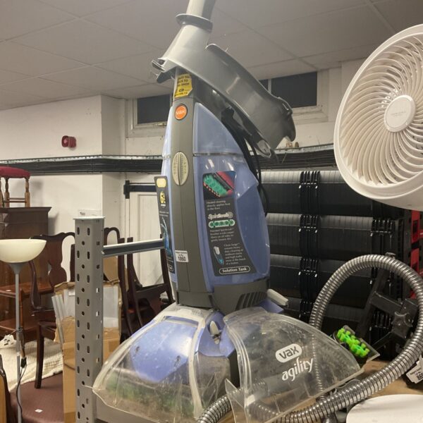 Used Vax carpet cleaner with hose and solution tank.